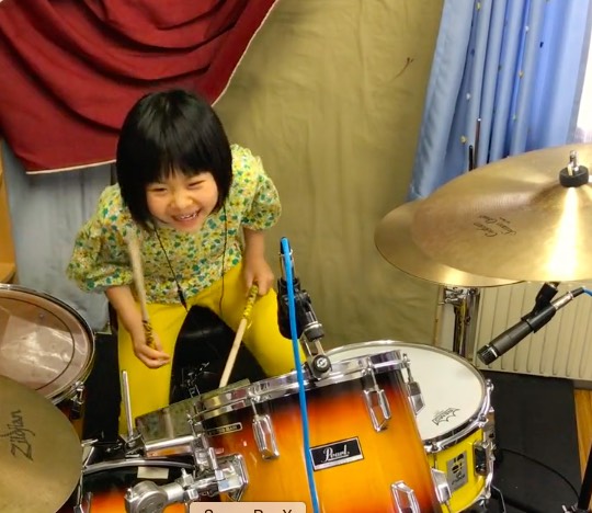 8 year old that 2025 plays drums to led zeppelin