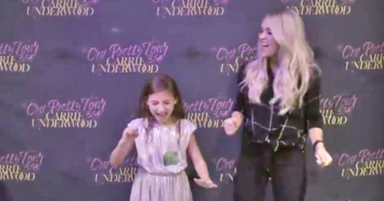 We love this little girl who is deaf signing Carrie Underwood's