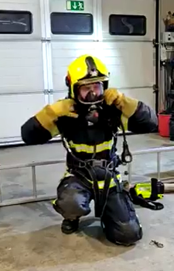 Firefighter Wriggles Through Tiny Opening In Training Exercise ...