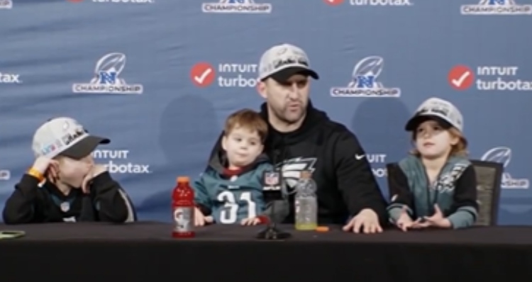 Nick Siriani with his kids at a press conference