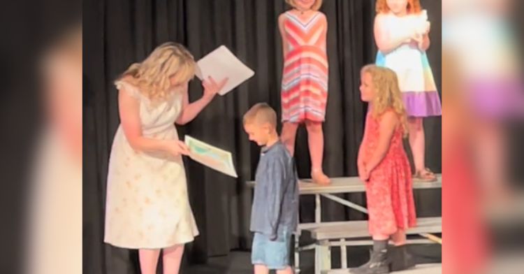 A kindergarten student made an impression during graduation.