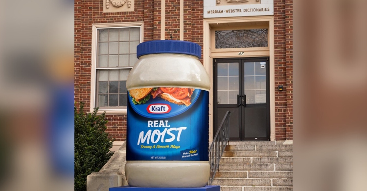 An 8 ft. jar of Kraft May sat in front of the staircase of Merriam-Webster's headquarters. The front of the jar reads "Real MOIST."