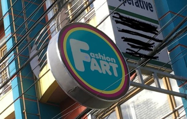 A sign for a business that makes it look like the business name is Fashion Fart.