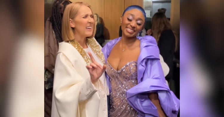 Celine Dion and Sonyae Elise stand with an arm wrapped around the other right after the Grammys. Dion has her eyes closed and a hand raised as she sings passionately. Elise smiles and closes her eyes as she sings along.
