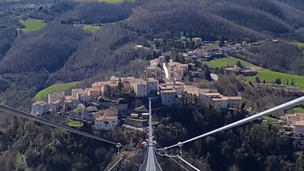 Suspension bridge spanning the the Vigi River valley in Italy.