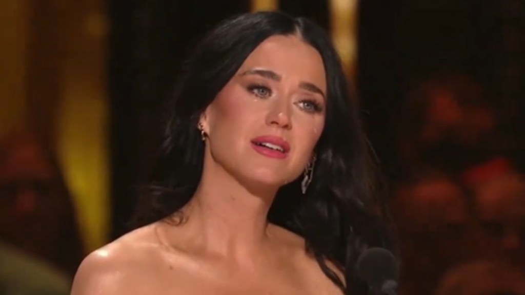 Close up of Katy Perry crying.