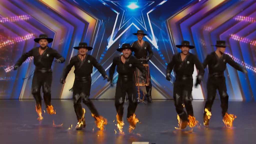 legion dancing on the AGT stage with their boots on fire