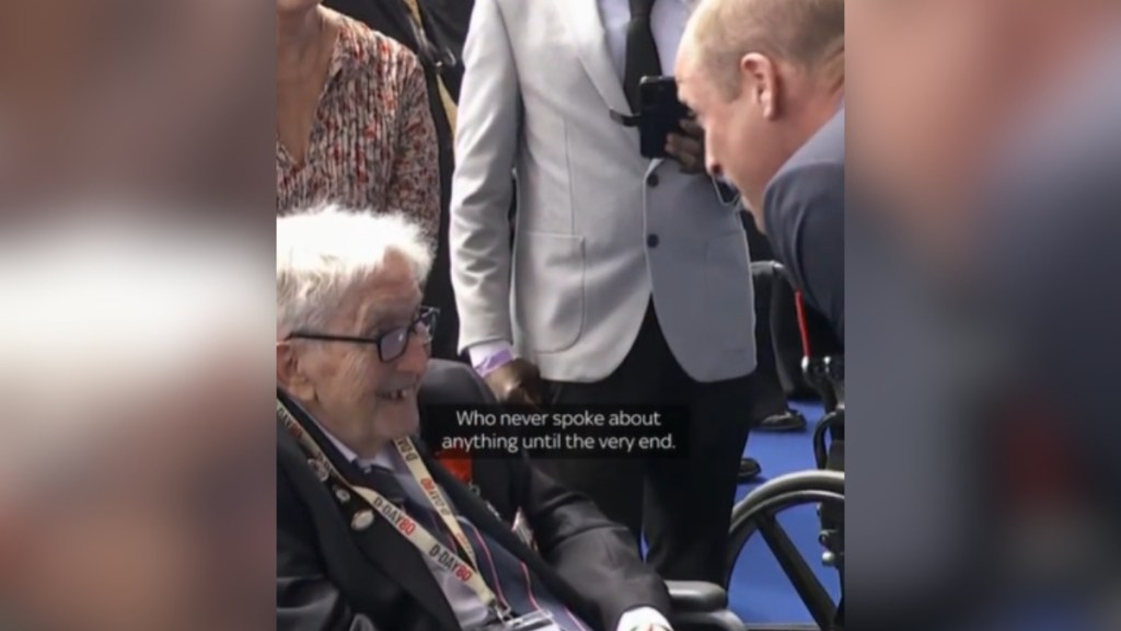 A WWII vet sits as he talks with Prince William. The vet smiles as William talks. Text on the image shows what he's saying: ... who never spoke about anything until the very end.