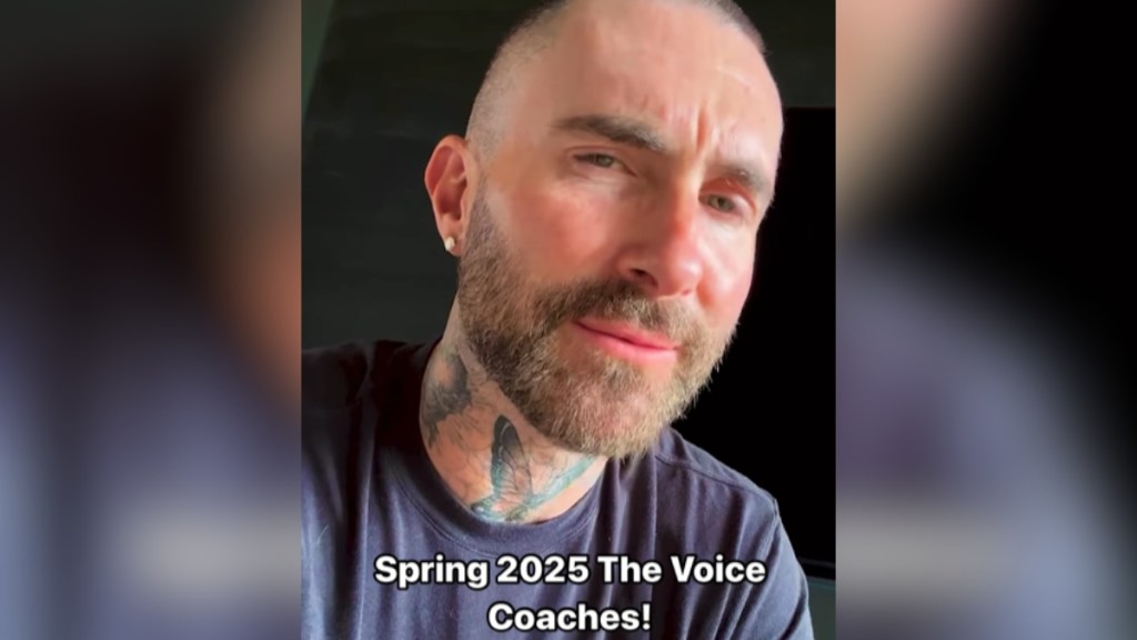 Adam Levine looks into the camera with a serious look on his face. Text on the image reads: Spring 2025 The Voice Coaches!