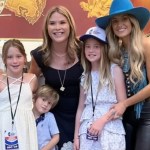 Jenna Bush and her three kids, including Hal Hager, smile as they pose with Lainey Wilson. Hal stands next to his mom shyly. His mom and sister stand between him and Wilson.