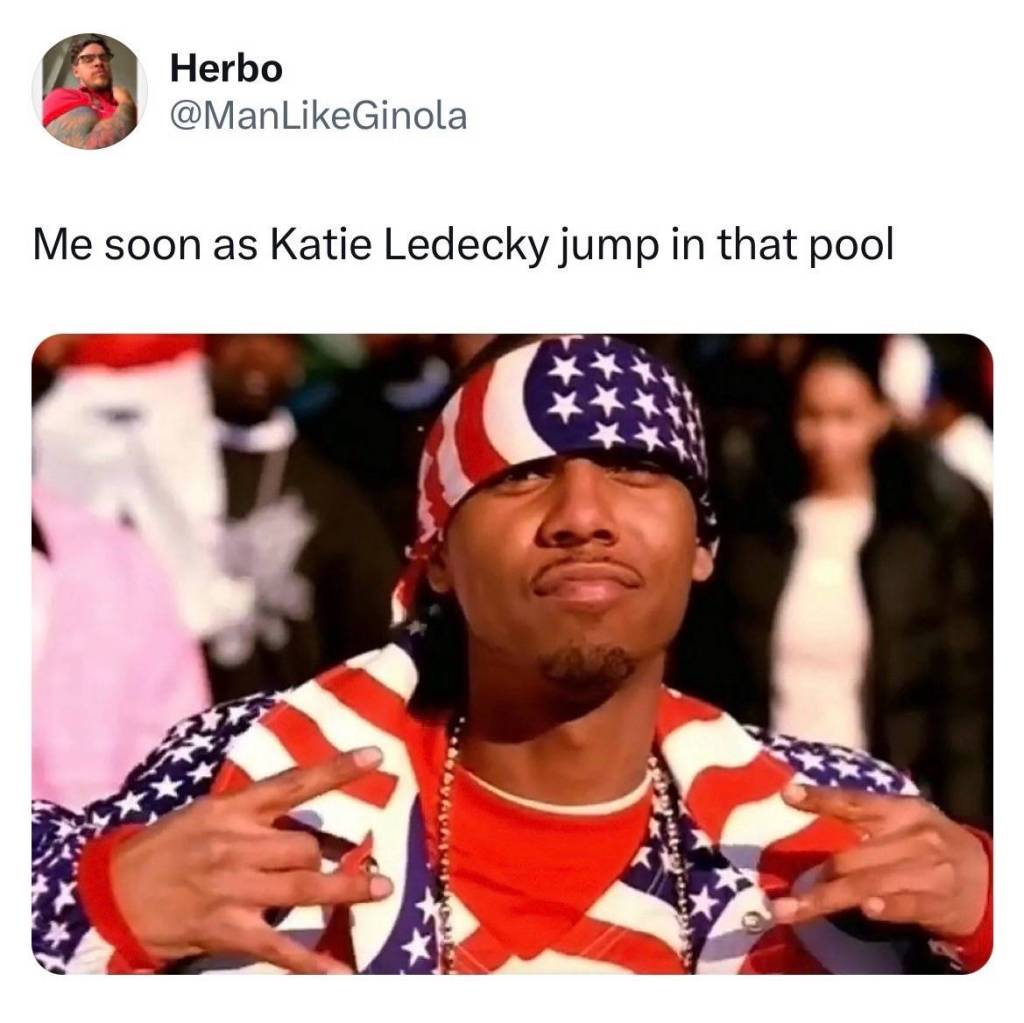 Tweet from @ManLikeGinola: Me soon as Katie Ledecky jump in that pool

Image attached: A man dressed in all American Flag clothes poses