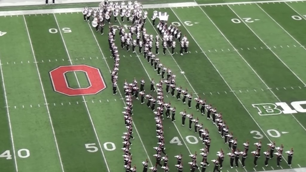 Ohio State's marching band forms to a person that is dancing like Michael Jackson