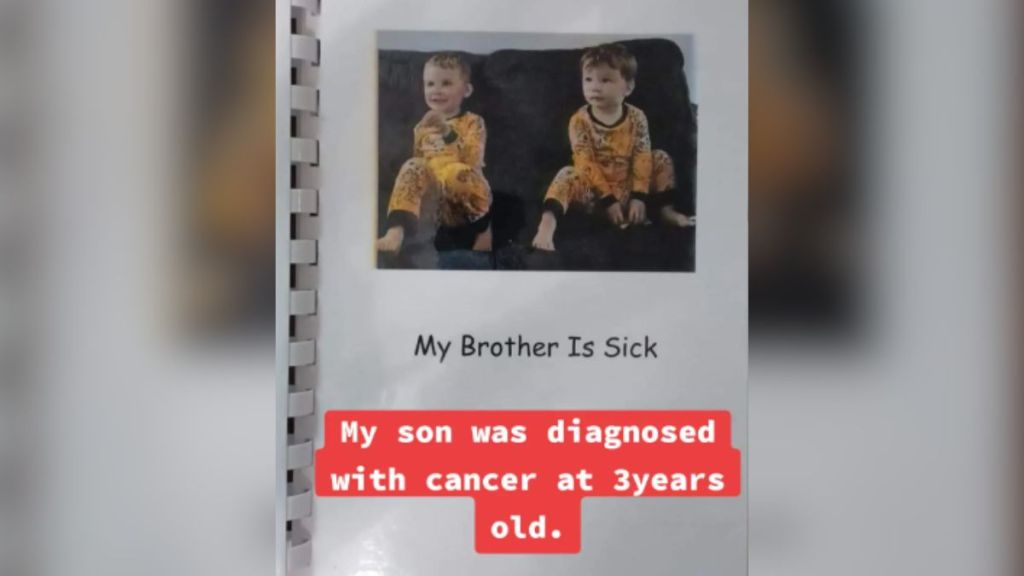 A picture of two boys in a book about cancer.