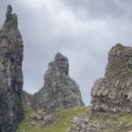 Image shows a view of the Old Man of Storr rock formation on the Isle of Skye in Scotland.