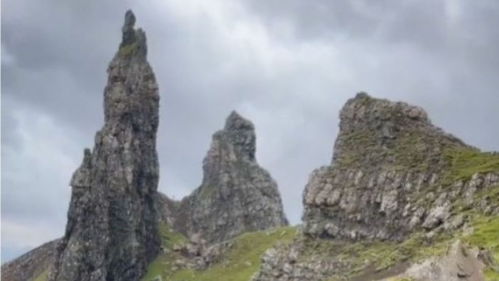 Image shows a view of the Old Man of Storr rock formation on the Isle of Skye in Scotland.