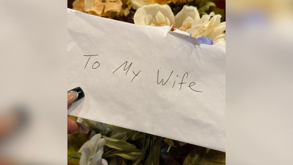 An envelope that reads "To My Wife."