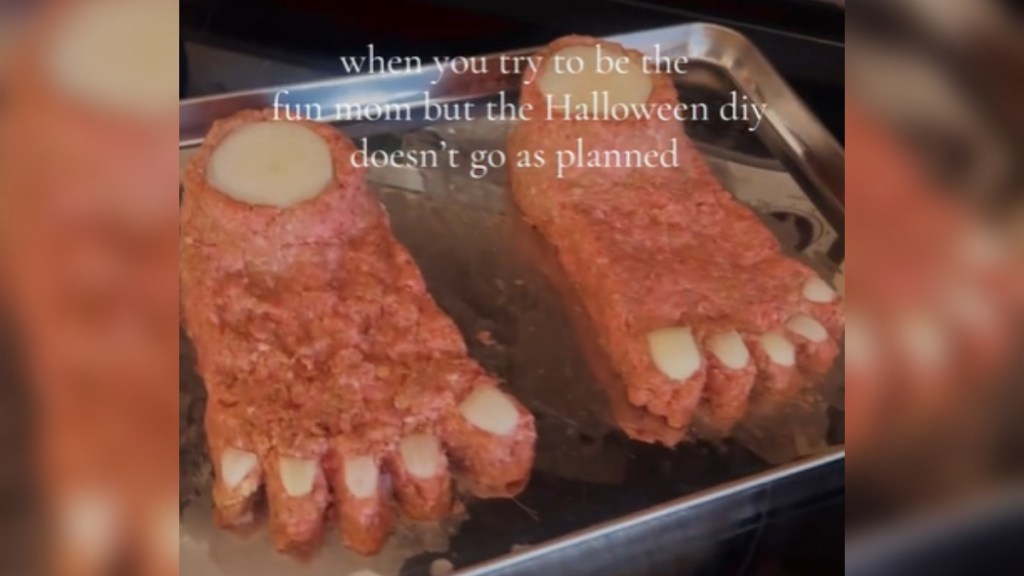 View of uncooked meatloaf shaped to look like feet. Text on the image: when you try to be the fun mom but the Halloween diy doesn't go as planned