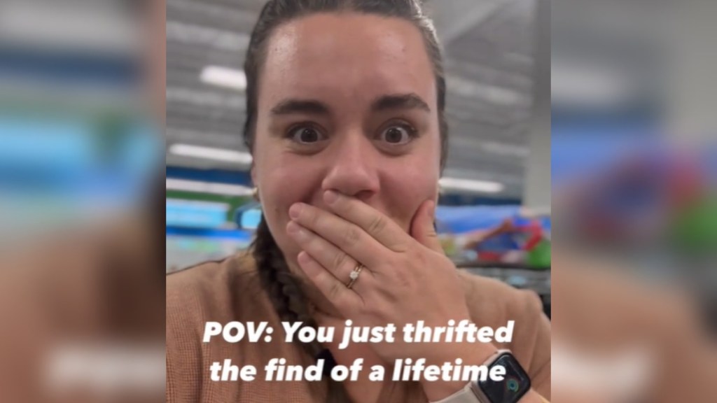 Close up of a woman with eyes wide as she covers her mouth with her hand. Text on the image reads: POV: You just thrifted the find of a lifetime