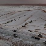 Image shows a panoramic view of Saudi Arabia's Al-Jawf region as the desert experiences its first snow.