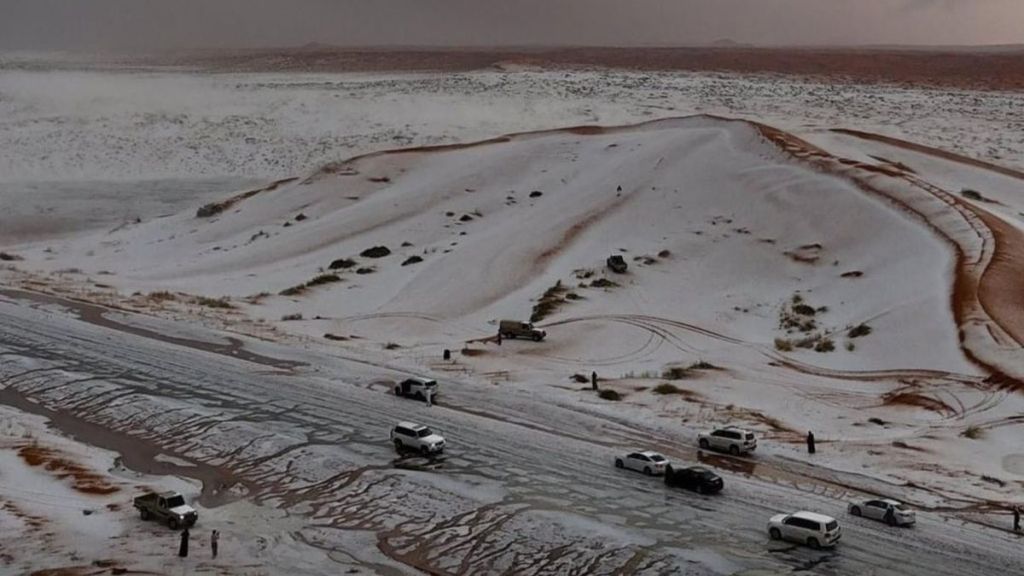 Image shows a panoramic view of Saudi Arabia's Al-Jawf region as the desert experiences its first snow.