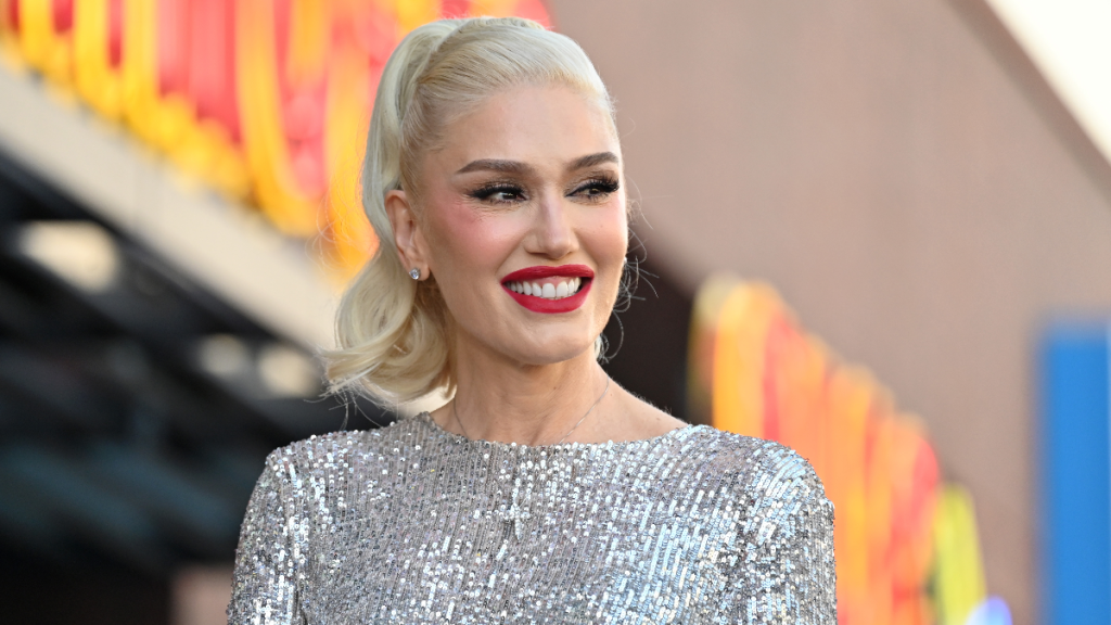 Gwen Stefani Shares Halloween Pics Of When She’d Just Met Blake Shelton & Fans Are “Swallowing Tears”