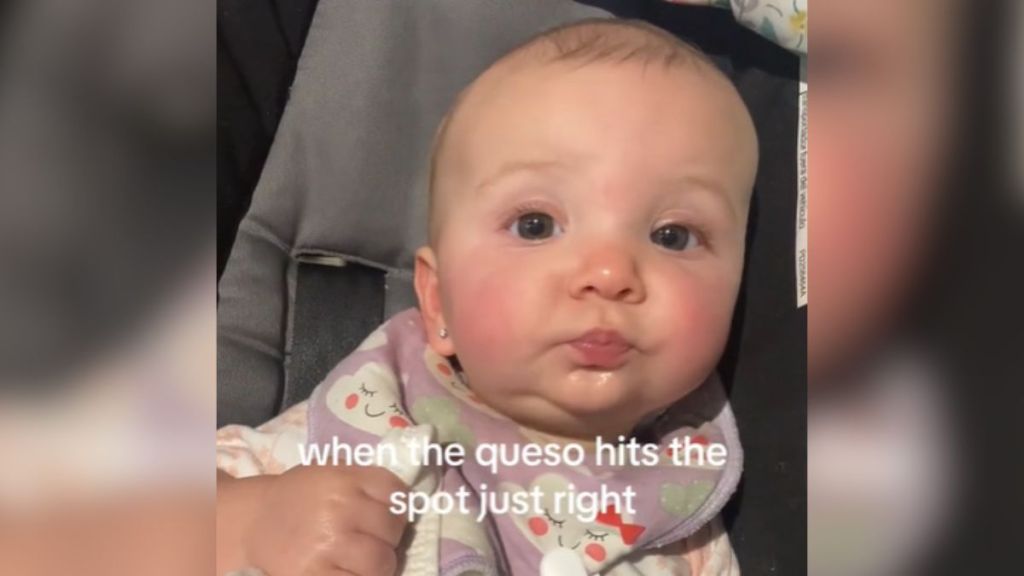 A baby tasting something new for the first time.