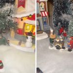 Image shows a Christmas village where the daughter has added toy soldiers as a prank.