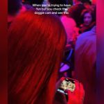 A woman looking at her phone during a night out.