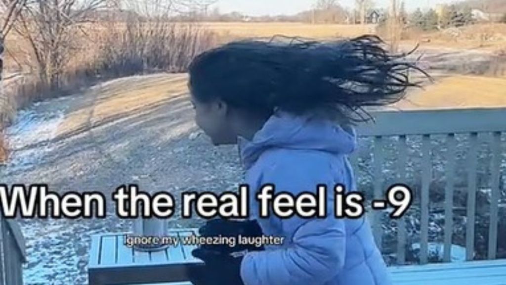 After her dad tried a frozen hair experiment a young girl's frozen hair was sticking out at 90-degree angle.