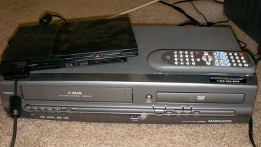 Image shows a VHS player and DVD recorder to convert VHS tapes to DVDs.