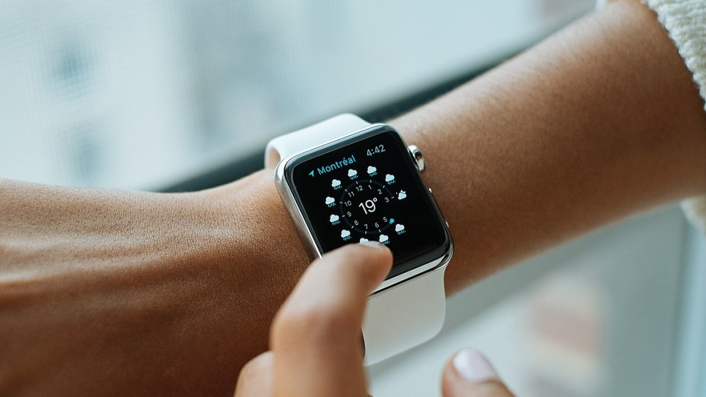 Close up of an Apple Watch on someone's wrist.