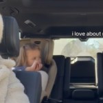 View from the front seat of a vehicle. A woman smirks as she looks back and out of the corner of her eyes at her two kids in the back. Text on the image reads: I love about Nora...