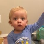 One-year-old uses nonverbal signs to help his mom guess his daily song requests.