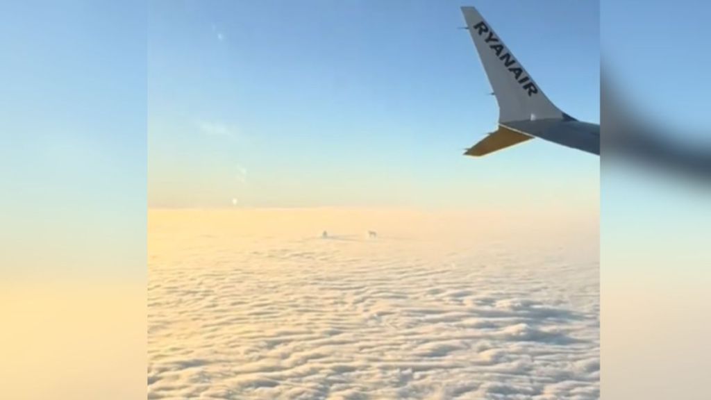 A view of the clouds from an airplane window.