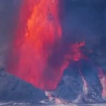 Zoomed-in view of Hawaii's Kilauea volcano as it erupts, lots of lava spewing high into the air