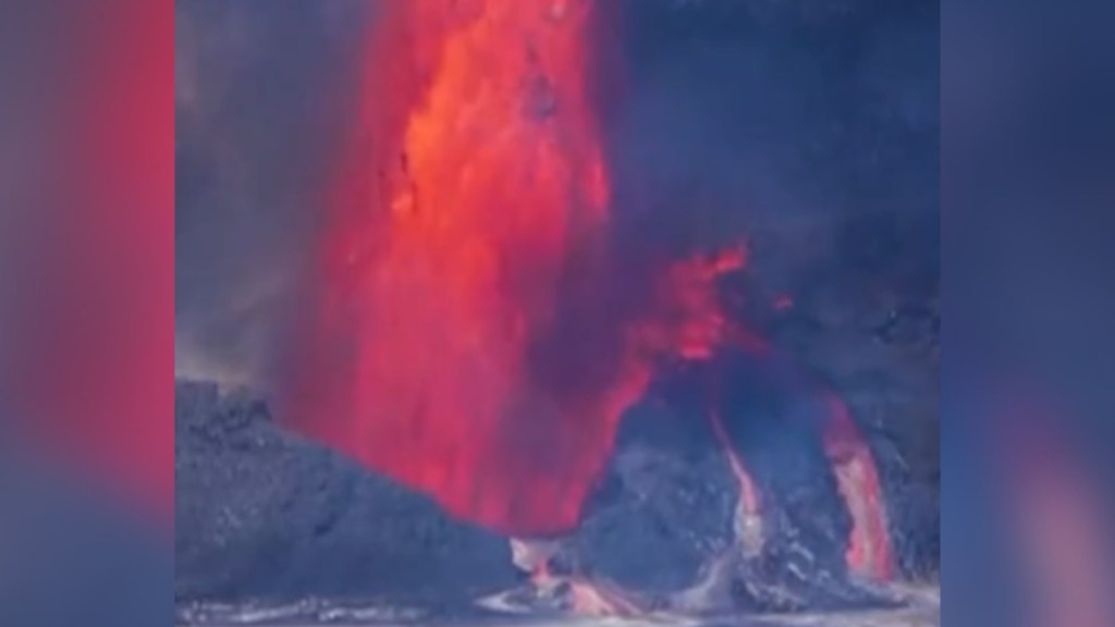 Zoomed-in view of Hawaii's Kilauea volcano as it erupts, lots of lava spewing high into the air