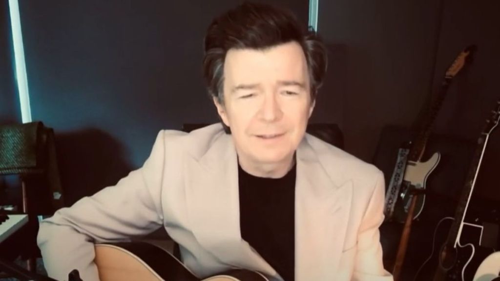 Image shows Rick Astley performing an acoustic version of Chappell Roan's Pink Pony Club.